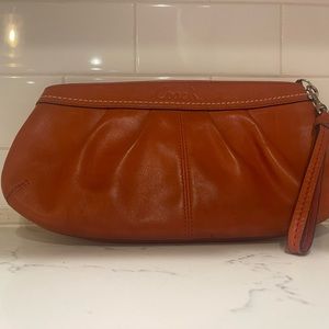 Coach Burnt Orange Soho Leather Clutch